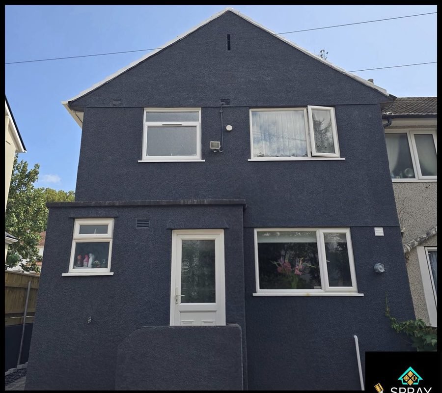 House exterior — after masonry respray, Devon